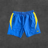 SYNA WORLD VORTEX WOVEN SHORT [BLUE/YELLOW]