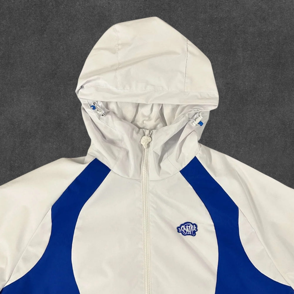 SYNA WORLD VORTEX WOVEN JACKET [WHITE/BLUE]